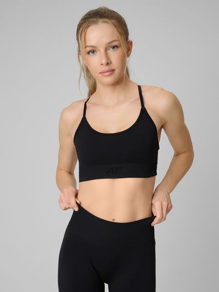 4F Biustonosz treningowy bezszwowy z niskim wsparciem damski - czarny M/L. Czarne biustonosze 4f, bez wzorów, ze skóry. Za 99,99 zł.