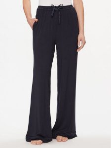 Tommy Hilfiger Spodnie dresowe UW0UW05195 Granatowy Relaxed Fit. Niebieskie spodnie dresowe TOMMY HILFIGER, xs, bez wzorów, z dresówki. Za 229,99 zł.
