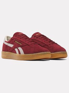 Reebok Skórzane sneakersy "Club C Grounds" w kolorze czerwonym rozmiar: 42,5. Czerwone trampki Reebok, bez wzorów, z materiału, bez zapięcia. Za 303,06 zł.
