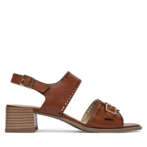 Sandały Caprice. Brązowe sandały Caprice, bez wzorów, bez obcasa, na słupku, bez zapięcia. Za 339,99 zł.