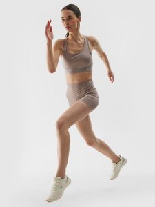 4F Legginsy krótkie treningowe z materiału z recyklingu damskie - beżowe XL. Brązowe legginsy 4f, bez wzorów, z dzianiny, z podwyższonym stanem, krótkie. W wyprzedaży za 39,99 zł.