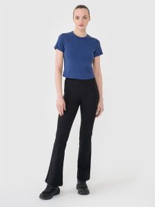 4F Legginsy z rozszerzanymi nogawkami damskie - czarne M. Czarne legginsy 4f, bez wzorów, z bawełny, z podwyższonym stanem, długie. W wyprzedaży za 79,99 zł.