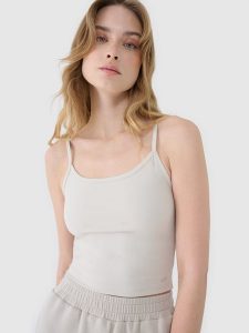 4F Crop-top slim damski - beżowy L. Brązowe topy 4f, l, bez wzorów, z dzianiny, sportowe, bez kołnierzyka, bez ramiączek. Za 29,99 zł.