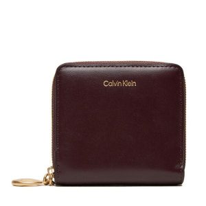 Portfel Calvin Klein. Czerwone portfele Calvin Klein, bez wzorów. Za 179,99 zł.