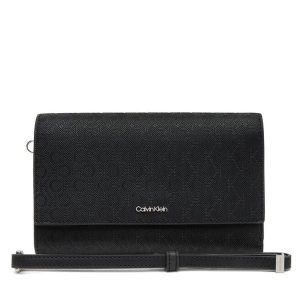 Portfel Calvin Klein. Czarne portfele Calvin Klein, bez wzorów. Za 259,99 zł.