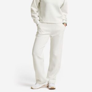 Spodnie dresowe damskie Gym & Pilates. Białe spodnie dresowe DECATHLON, l, bez wzorów, z dresówki. Za 129,99 zł.