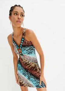 Sukienka z dżerseju o trapezowym kroju. Niebieskie sukienki bonprix, na imprezę, na lato, z aplikacjami, z dżerseju, eleganckie, bez kołnierzyka, bez ramiączek, trapezowe. Za 139,99 zł.