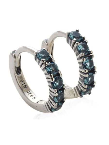 Pandora Srebrne kolczyki-kreole z kryształami rozmiar: onesize. Niebieskie kolczyki Pandora, z kryształem, srebrne. Za 192,33 zł.