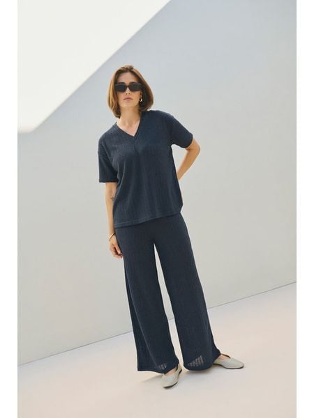 Kaffe Koszulka dzianinowa w kolorze granatowym rozmiar: XL. Niebieskie bluzki Kaffe, xl, bez wzorów, z dzianiny, bez kołnierzyka, bez ramiączek. Za 118,84 zł.