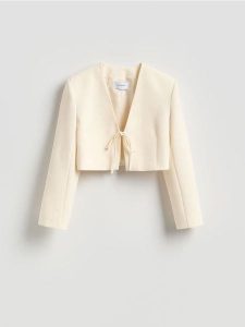 Krótka marynarka z wiązaniem - złamana biel. Marynarki i żakiety Reserved, l, bez wzorów, z tkaniny. Za 199,99 zł.