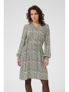 Kaffe Sukienka w kolorze kremowym rozmiar: 36. Brązowe sukienki Kaffe, bez wzorów, bez kołnierzyka, bez ramiączek, midi. Za 130,99 zł.