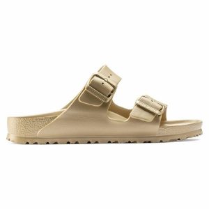 Klapki Birkenstock Arizona 1022465 złoty. Żółte klapki bez wzorów, z materiału, bez obcasa. Za 361,45 zł.