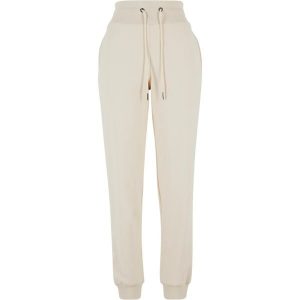 Damskie spodnie dresowe Urban Classics Cozy. Białe spodnie sportowe Urban Classics, bez wzorów, z bawełny, do biegania. Za 244,50 zł.