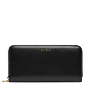 Portfel Calvin Klein. Czarne portfele Calvin Klein, bez wzorów. Za 259,99 zł.
