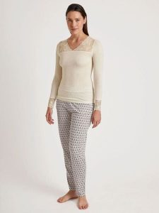 Calida Wełniana koszulka w kolorze beżowym rozmiar: L. Brązowe bluzki Calida, l, bez wzorów, z koronki, bez kołnierzyka, bez ramiączek. Za 202,95 zł.