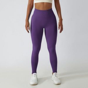 Legginsy treningowe modelujące sylwetkę z wysokim stanem Gulli. Brązowe legginsy Intica, bez wzorów, z tkaniny, z podwyższonym stanem. Za 139,00 zł.