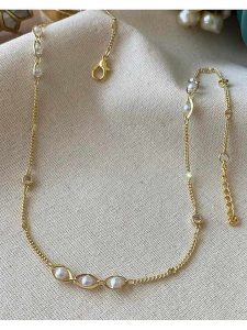 Luseera Pozłacany naszyjnik z kryształami - dł. 45 cm rozmiar: onesize. Białe naszyjniki Luseera, z kryształem, pozłacane. Za 34,99 zł.