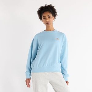 Bluza damska New Balance WT43559CUH – niebieska. Niebieskie bluzy New Balance, xl, bez wzorów, z bawełny, bez kaptura. Za 129,99 zł.