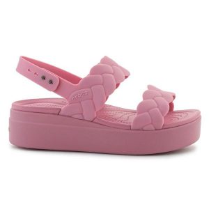 Sandały Crocs Brooklyn Woven Low Wedge 209977-6XX różowe. Czerwone sandały bez wzorów, bez obcasa, na koturnie, bez zapięcia. Za 367,32 zł.