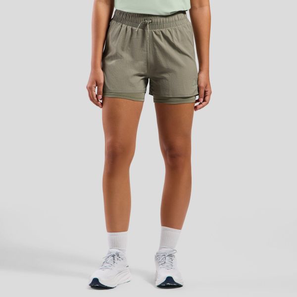 Spodenki damskie Odlo ZEROWEIGHT 3 INCH 2-in-1 short. Zielone szorty ODLO, bez wzorów, sportowe. Za 339,99 zł.