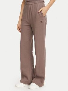 Calvin Klein Jeans Spodnie dresowe Monogram LV047H220G Beżowy ciemny Regular Fit. Brązowe spodnie dresowe Calvin Klein Jeans, m, bez wzorów, z bawełny. Za 369,99 zł.