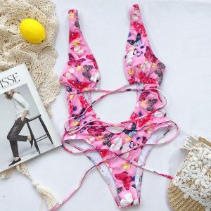 Jednoczęściowy strój kąpielowy z wycięciami na plażę i basen Rhonda. Stroje jednoczęściowe Intica, bez wzorów, z materiału. Za 129,00 zł.