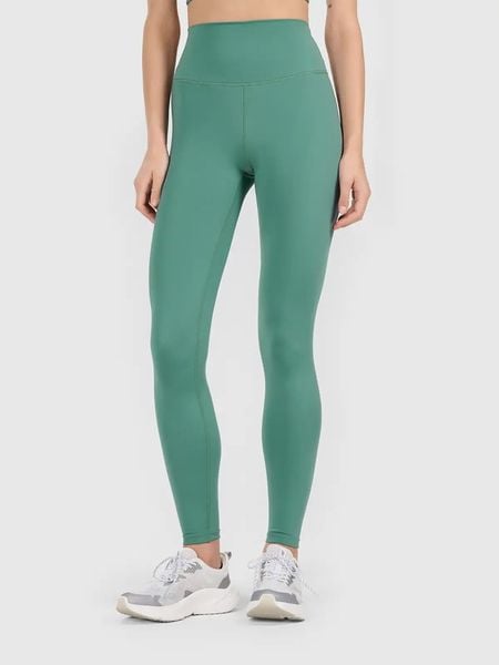 4F Legginsy sportowe w kolorze zielonym rozmiar: XS. Zielone legginsy 4f, xs, bez wzorów, z materiału, z podwyższonym stanem, outdoorowe. Za 99,95 zł.
