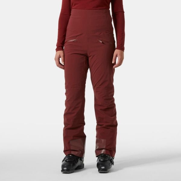 Spodnie narciarskie dla kobiet Helly Hansen Alphelia Hi Waist. Czerwone spodnie z wysokim stanem Helly Hansen, bez wzorów. W wyprzedaży za 1 207,50 zł.
