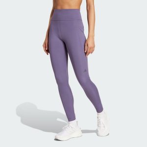 Legginsy Own the Run 7/8. Fioletowe legginsy ADIDAS, bez wzorów, z materiału. W wyprzedaży za 217,62 zł.