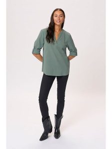 Kaffe Bluzka w kolorze turkusowym rozmiar: 46. Niebieskie bluzki Kaffe, bez wzorów, z bawełny, bez kołnierzyka, bez ramiączek. Za 60,99 zł.