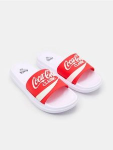 Klapki Coca-Cola - wielobarwny. Klapki Sinsay, bez wzorów, bez obcasa. Za 35,99 zł.