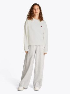 TOMMY JEANS Bluza w kolorze kremowym rozmiar: S. Brązowe bluzy Tommy Jeans, s, bez wzorów, z bawełny, bez kaptura. Za 199,95 zł.