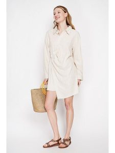 ASSUILI Lniana sukienka w kolorze kremowym rozmiar: 40. Brązowe sukienki Assuili, na co dzień, bez wzorów, ze lnu, bez kołnierzyka, bez ramiączek, mini, proste. Za 130,99 zł.