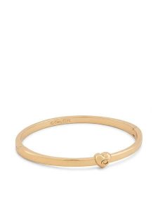 Coach Bransoletka 37571298 Złoty. Żółte bransoletki Coach, metalowe. Za 309,99 zł.