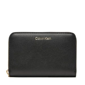 Portfel Calvin Klein. Czarne portfele Calvin Klein, bez wzorów. Za 169,99 zł.