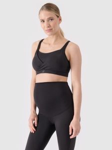 4F Biustonosz ciążowy treningowy ułatwiający karmienie damski - czarny M. Czarne biustonosze 4f, bez wzorów, z dzianiny. W wyprzedaży za 69,99 zł.