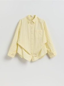 Bawełniana koszula w paski - jasnożółty. Żółte koszule Reserved, l, bez wzorów, z bawełny, bez kołnierzyka, bez ramiączek. Za 139,99 zł.