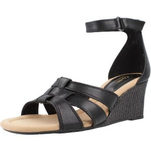 Sandały CLARKS KYARRA JOY Czarny. Czarne sandały Clarks, bez wzorów, ze skóry, bez obcasa, bez zapięcia. Za 192,99 zł.