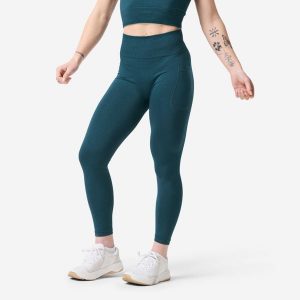 Legginsy do treningu siłowego damskie Domyos bezszwowe. Niebieskie legginsy DOMYOS, bez wzorów, z dzianiny, z podwyższonym stanem, długie. Za 99,99 zł.
