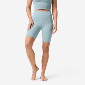 Legginsy krótkie do jogi i pilatesu Domyos. Niebieskie legginsy DOMYOS, bez wzorów, z materiału, z podwyższonym stanem, krótkie. Za 69,99 zł.