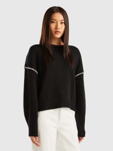 Benetton Sweter w kolorze czarnym rozmiar: M. Czarne swetry oversize Benetton, m, bez wzorów, z wełny, bez ramiączek. Za 141,19 zł.