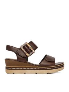 Remonte Sandały CEO-D2L53-25 Brązowy. Brązowe sandały Remonte, bez wzorów, ze skóry, bez obcasa, na koturnie, bez zapięcia. Za 379,99 zł.