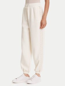 Guess Spodnie dresowe V5YB02 KB3P2 Écru Regular Fit. Spodnie dresowe Guess, m, z aplikacjami, z dresówki. Za 219,99 zł.