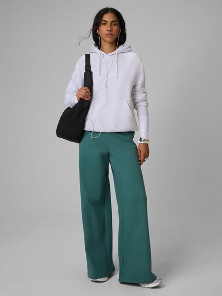 4F Spodnie dresowe z szerokimi nogawkami damskie - turkusowe XS. Niebieskie spodnie dresowe 4f, s, bez wzorów, z bawełny. Za 149,99 zł.