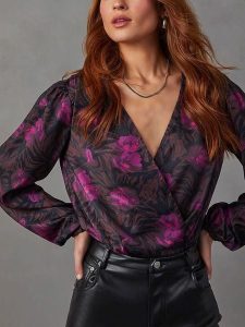 LA Angels Bluzka w kolorze czarno-fioletowym rozmiar: L. Czarne bluzki LA Angels, l, bez wzorów, bez kołnierzyka, bez ramiączek. Za 126,99 zł.