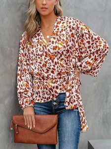 LA Angels Bluzka w kolorze biało-pomarańczowym rozmiar: XL. Białe bluzki LA Angels, xl, bez wzorów, bez kołnierzyka, bez ramiączek. Za 113,99 zł.