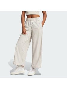 Adidas Spodnie dresowe Essentials 3-Stripes JC8168 Beżowy Loose Fit. Brązowe spodnie dresowe ADIDAS, xs, bez wzorów, z dresówki. Za 219,99 zł.