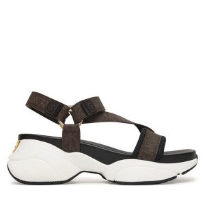 Sandały MICHAEL Michael Kors. Brązowe sandały MICHAEL Michael Kors, bez wzorów, bez obcasa, na płaskiej podeszwie, bez zapięcia. Za 599,99 zł.