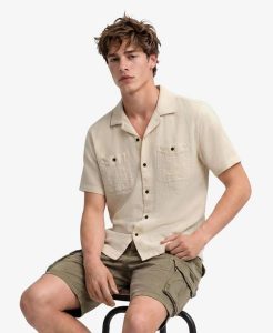 Superdry Koszula krótki rękaw teksturowana - The Merchant Store. Brązowe koszule Superdry, l, bez wzorów, z bawełny, bez kołnierzyka, bez ramiączek. Za 336,50 zł.