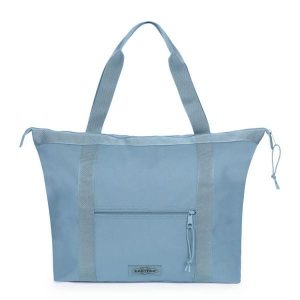 Torba na kółkach Eastpak Travel. Niebieskie torby podróżne i sportowe Eastpak, bez wzorów, na ramię. Za 297,00 zł.